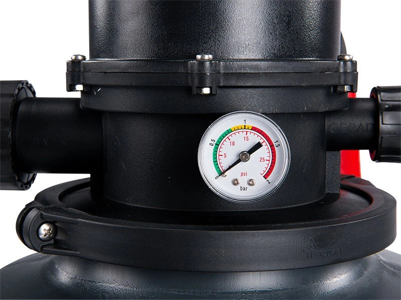 Black pressure gauge on a mechanical device with a white background