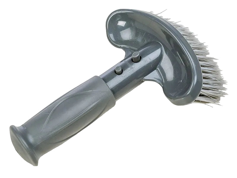 Gray spa brush with a handle on a white background
